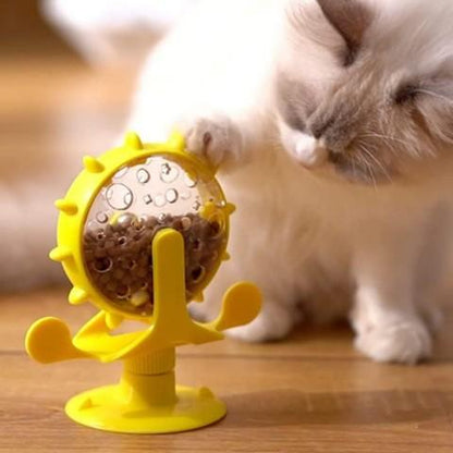 distributeur croquettes chat ludique plastique jaune roue jouet ventouse