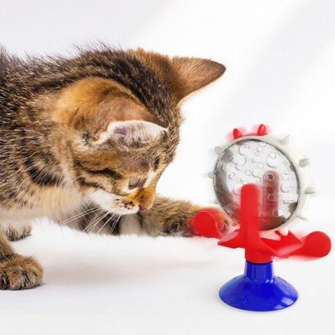 distributeur croquettes chat ludique plastique rouge roue jouet ventouse