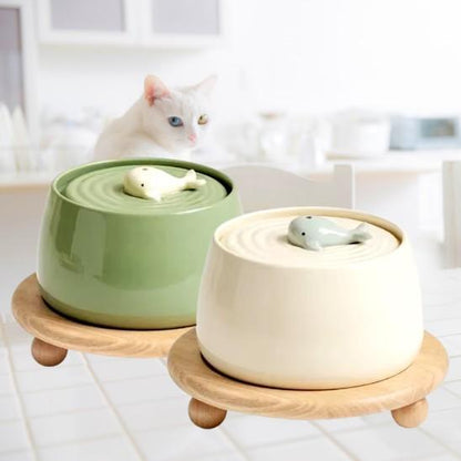 fontaine a eau chat ceramique baleine verte beige support bois 