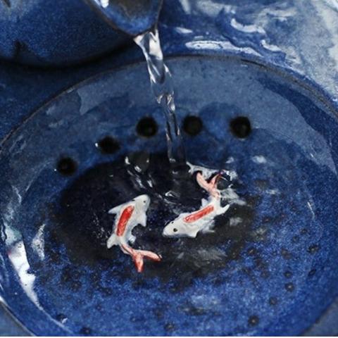 Intérieur fontaine a eau pour chat ceramique avec décor poisson